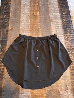 adjustable shirt extender designed to create a layered look without adding bulk